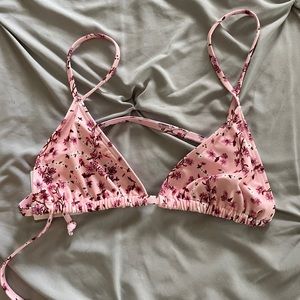 Kulani Kini’s triangle bikini top. Pink flower print. Size medium.